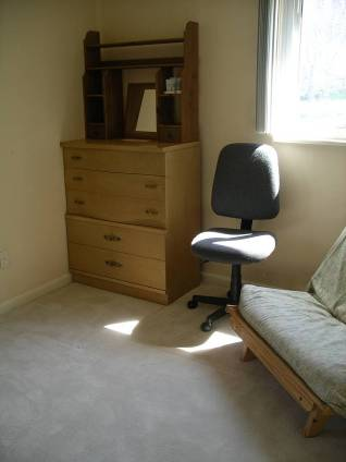 Center photo of second bedroom
